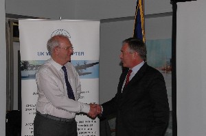 Col. John Kirby, (Ret.) (r), chapter president, thanks Quick for his presentation at the December meeting.